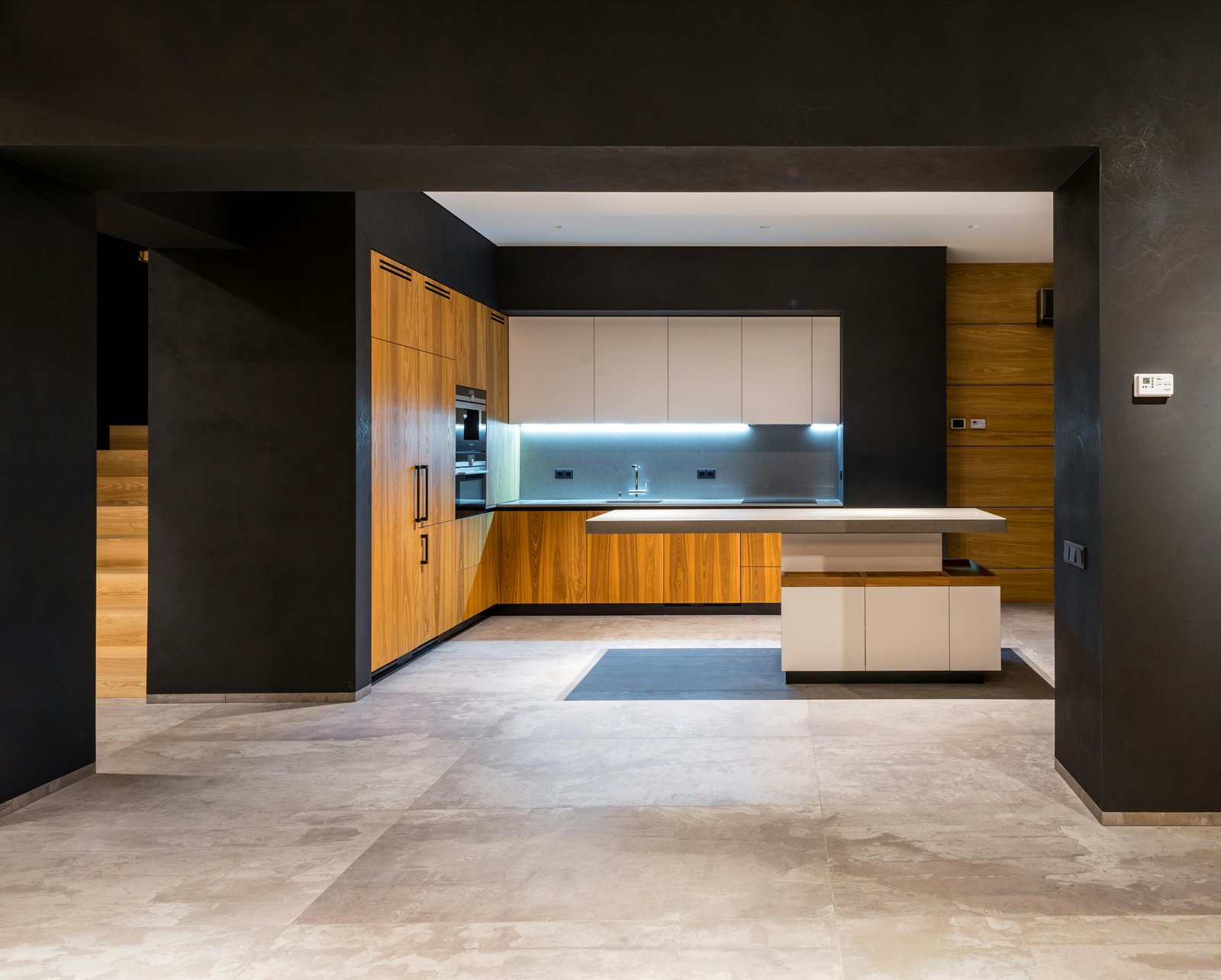 Moody Black & Timber Open-Plan Kitchen